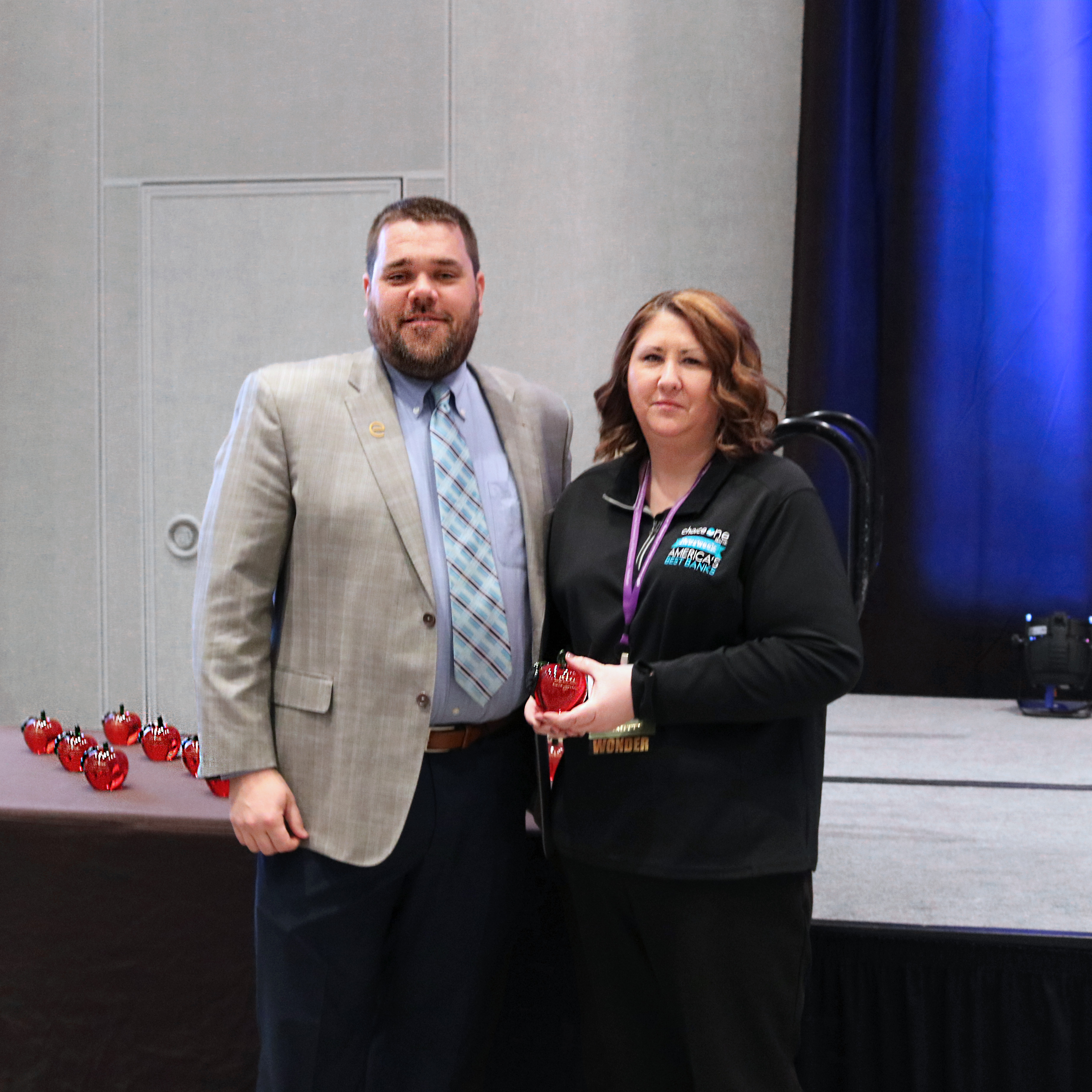 Pictured R-L: Danielle Chateauvert, Vice President Marketing of ChoiceOne Bank, receiving the award from Eric McKinney, Vice Chair of the MBA Marketing Committee.